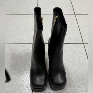 Versace Black Heeled Boots with Gold Zipper new VERSACE
Aevitas platform boots